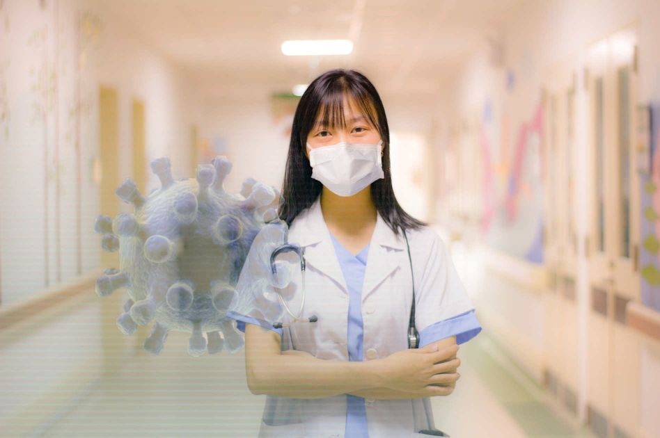 Pflegeperson und Stilisierung eines Virus' - Symbolfoto "Hygiene"